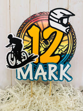 Load image into Gallery viewer, Mountain bike cake topper featuring MTB bike and rider, full face helmet, name, age, bicycle tire and wheel spokes