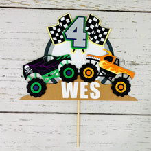 Load image into Gallery viewer, dueling monster truck cake topper with grave digger and el toro loco