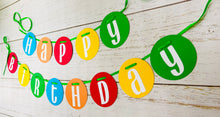 Load image into Gallery viewer, Primary colors circle pennant happy birthday banner strung on green satin ribbon.