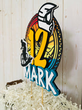 Load image into Gallery viewer, Mountain bike cake topper featuring MTB bike and rider, full face helmet, name, age, bicycle tire and wheel spokes