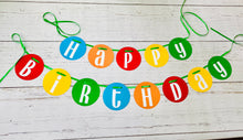Load image into Gallery viewer, Primary colors circle pennant happy birthday banner strung on green satin ribbon.