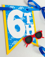Load image into Gallery viewer, Waterslide summer happy birthday banner featuring fun summer elements that include ice cream, water guns, water balloons, umbrellas, sunglasses, beach chairs, beach balls and a waterslide.