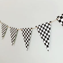 Load image into Gallery viewer, This checkered flag pennant banner can be used in so many different ways and for so many different themes! From a two fast or fast one racing themed birthday party to monster trucks or dirt bikes, this checkered flag pennant banner is the perfect size to adorn your refreshments table, hanging with a balloon garland to make that perfect photo backdrop or hanging overhead for extra fun. After the party, hang it in your little one's bedroom or playroom!