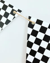 Load image into Gallery viewer, This checkered flag pennant banner can be used in so many different ways and for so many different themes! From a two fast or fast one racing themed birthday party to monster trucks or dirt bikes, this checkered flag pennant banner is the perfect size to adorn your refreshments table, hanging with a balloon garland to make that perfect photo backdrop or hanging overhead for extra fun. After the party, hang it in your little one's bedroom or playroom!