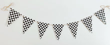 Load image into Gallery viewer, This checkered flag pennant banner can be used in so many different ways and for so many different themes! From a two fast or fast one racing themed birthday party to monster trucks or dirt bikes, this checkered flag pennant banner is the perfect size to adorn your refreshments table, hanging with a balloon garland to make that perfect photo backdrop or hanging overhead for extra fun. After the party, hang it in your little one's bedroom or playroom!