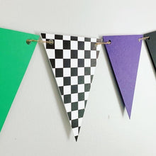 Load image into Gallery viewer, Grave Digger pennant banner that will be the perfect addition to your Grave Digger Monster Jam monster truck party! Featuring a checkered flag pennant, purple, green and black pennants, this Grave Digger birthday banner will look amazing adorning your concessions table, hung with a balloon garland or used a backdrop to capture those amazing birthday party memories!