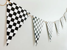 Load image into Gallery viewer, This checkered flag pennant banner can be used in so many different ways and for so many different themes! From a two fast or fast one racing themed birthday party to monster trucks or dirt bikes, this checkered flag pennant banner is the perfect size to adorn your refreshments table, hanging with a balloon garland to make that perfect photo backdrop or hanging overhead for extra fun. After the party, hang it in your little one's bedroom or playroom!