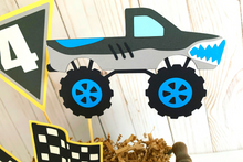 Load image into Gallery viewer, Monster Jam inspired monster truck birthday party decorations featuring Megladon, El Toro Loco, Grave Digger, Dragon and Tornado monster trucks.