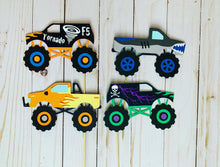 Load image into Gallery viewer, Monster Jam inspired monster truck cutouts handcrafted by Declan & Smith Party Decor. The trucks are cut from cardstock and assembled by hand. The truck cutouts are avaiable with or without the skewer and can be used in a variety of ways for your monster jam monster truck party.
