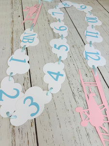 pink and grey airplane 1st birthday photo banner