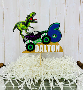 monster jam truck and T-Rex dinosaur cake topper