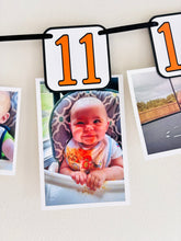 Load image into Gallery viewer, black orange and white racing first birthday monthly photo banner
