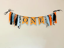 Load image into Gallery viewer, McLaren Formula One racing inspired birthday banner featuring blue orange and black and checkered flag fabric
