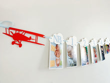 Load image into Gallery viewer, Airplane time flies birthday decorations. Vintage biplane first birthday monthly milestones photo banner featuring white clouds, number NB - 12. 
