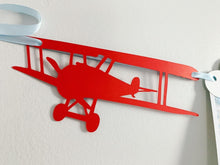 Load image into Gallery viewer, Airplane time flies birthday decorations. Vintage biplane first birthday monthly milestones photo banner featuring white clouds, number NB - 12. 
