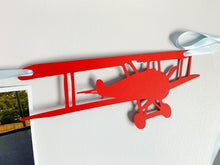 Load image into Gallery viewer, Airplane time flies birthday decorations. Vintage biplane first birthday monthly milestones photo banner featuring white clouds, number NB - 12. 

